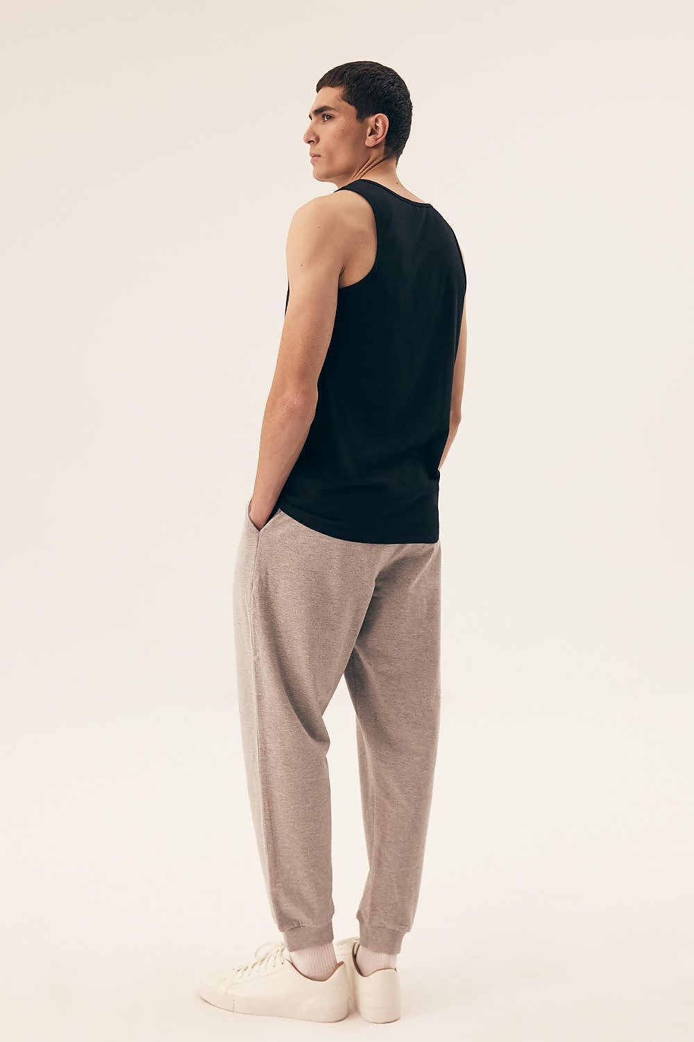 Henderson Men's Cotton Spandex Tank Tops in multiple sizes, highlighting premium cotton and spandex blend for exceptional comfort and freedom of movement.