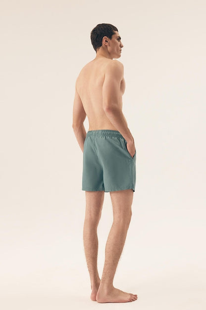 Henderson Men's Swim Shorts displayed in various sizes, reflecting luxury style and functionality for summer adventures.