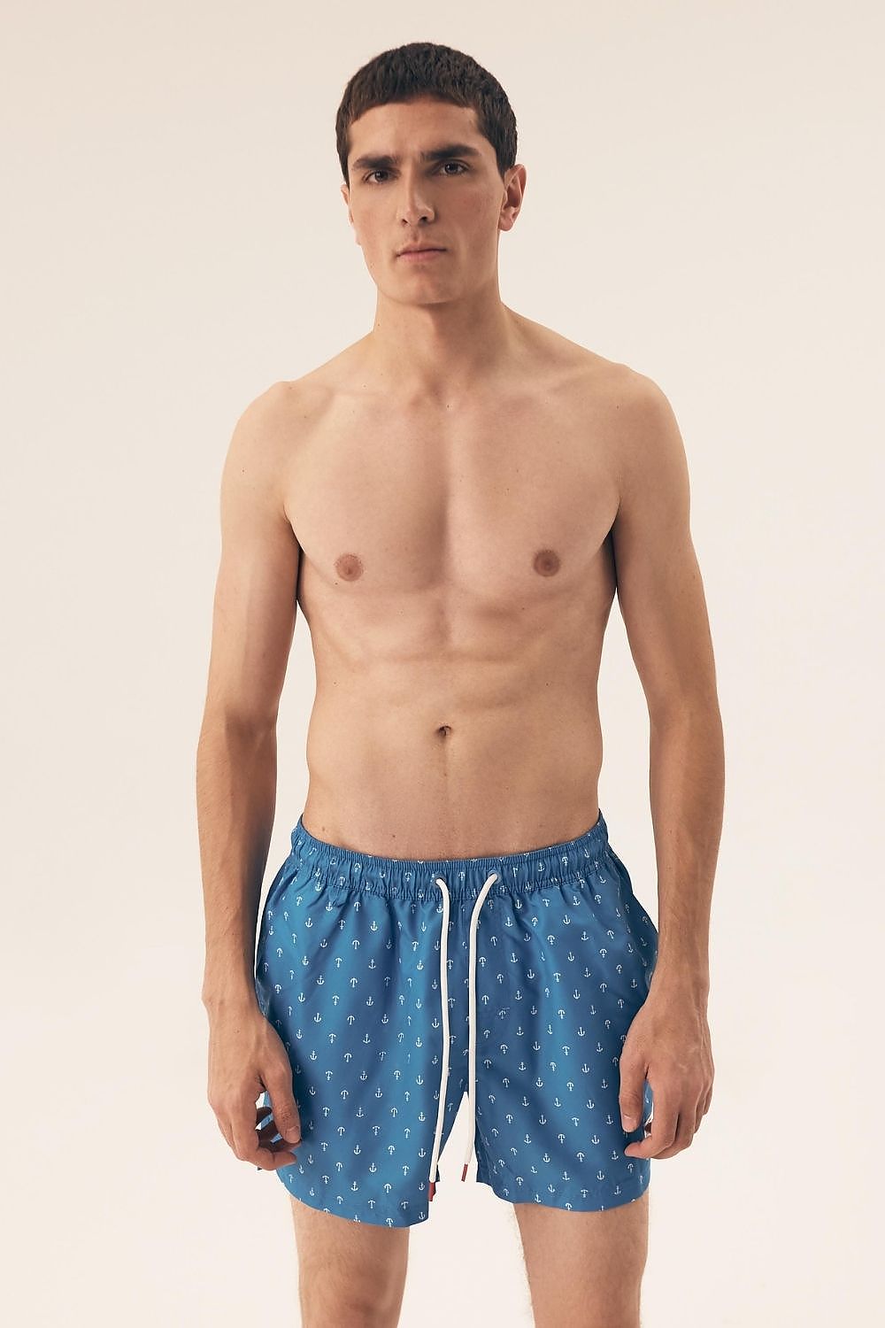 Luxury Henderson Men's Swim Trunks featuring eye-catching print and quick-drying fabric, perfect for stylish pool or beach outings.