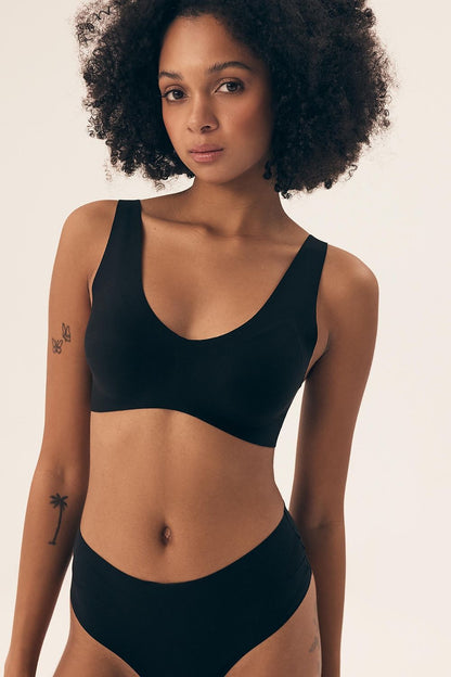 Close-up of Luxury Henderson Padded Bra detailing the soft microfiber fabric and laser-cut edges for invisibility under clothing.