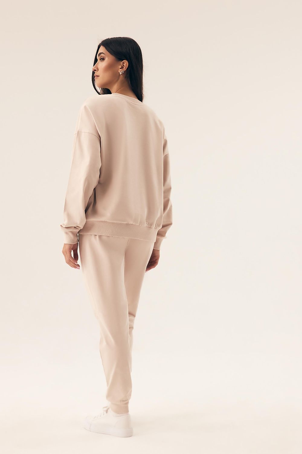 Elegant Henderson Women's Cotton Tracksuit Set featuring long pants with a wide waistband and ribbed cuffs, combining comfort and contemporary sporty chic.