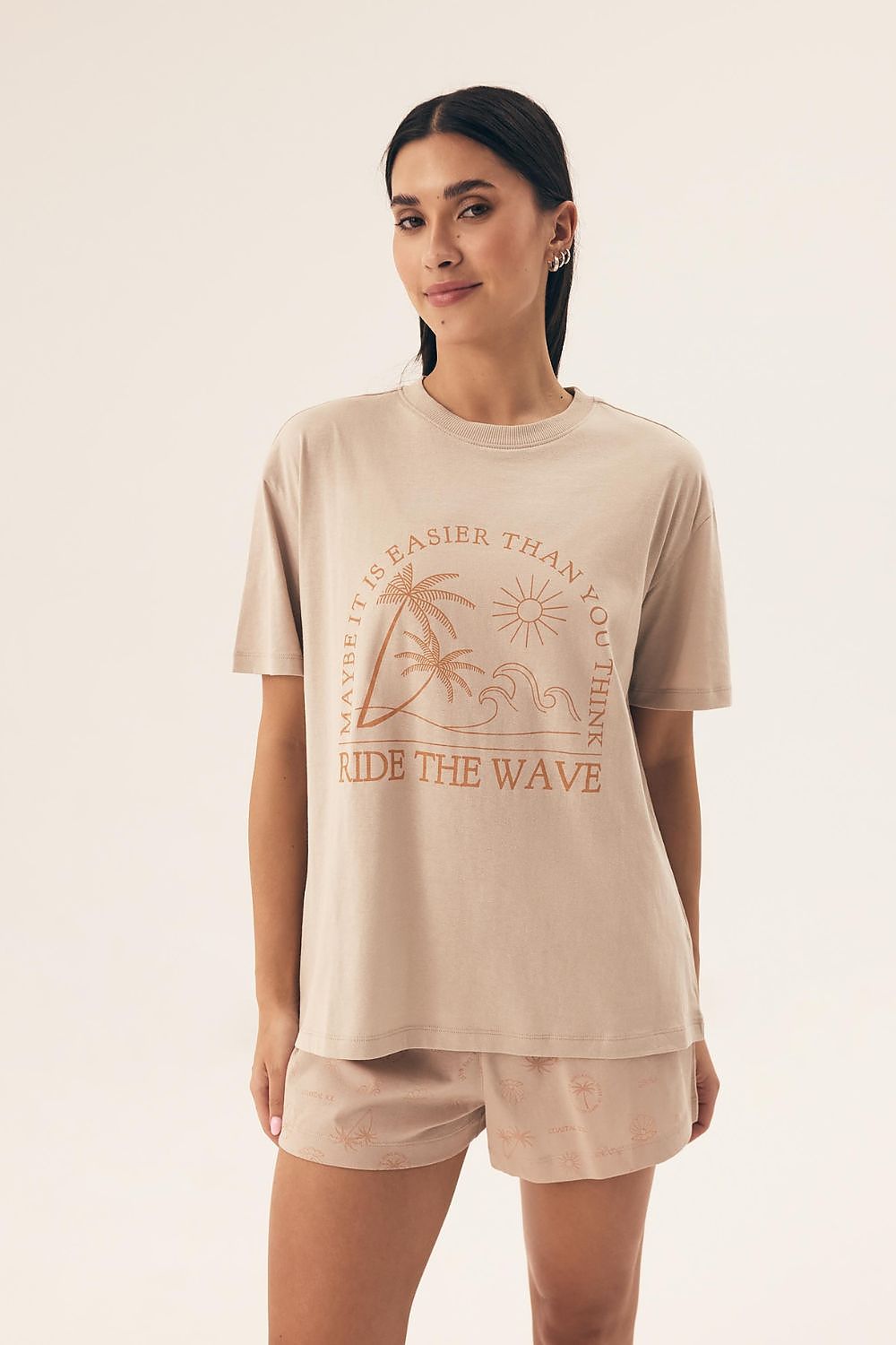 Luxury Henderson women's cotton pyjamas set featuring short sleeves and stylish print shorts, perfect for relaxing at home.