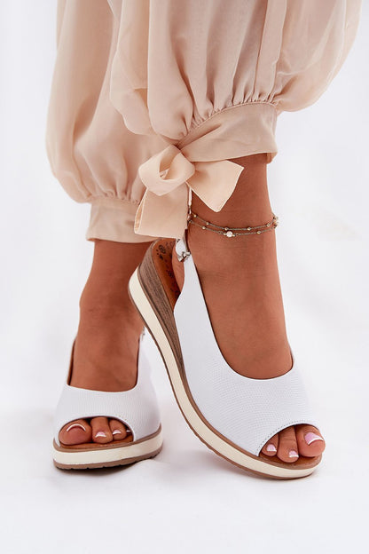 Elegant women's natural leather wedge sandals by Step in Style, featuring a chic adjustable strap and 5cm heel, perfect for stylish summer outings.