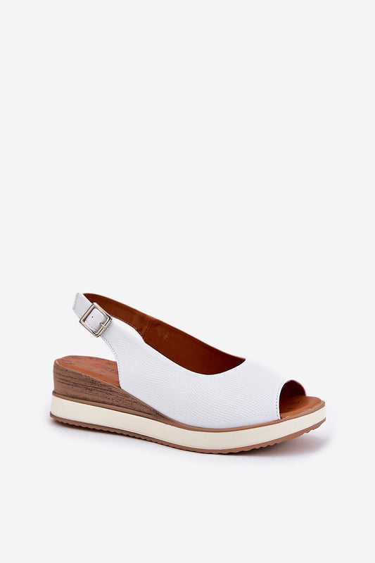 Step in Style natural leather wedge sandals showcasing a sophisticated design with a comfortable leather footbed, ideal for dressing up any outfit.