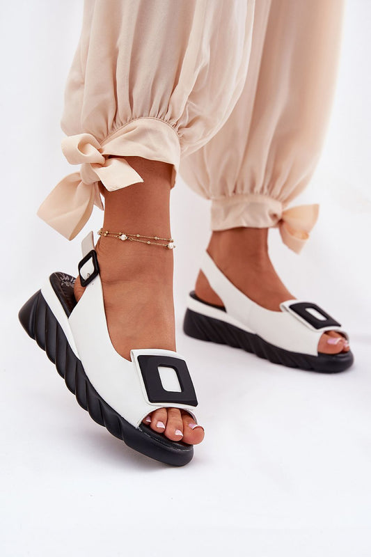 Elegant Women’s Natural Leather Wedge Sandals by Step in Style with Buckle, front view displaying unique leather texture and decorative elements.