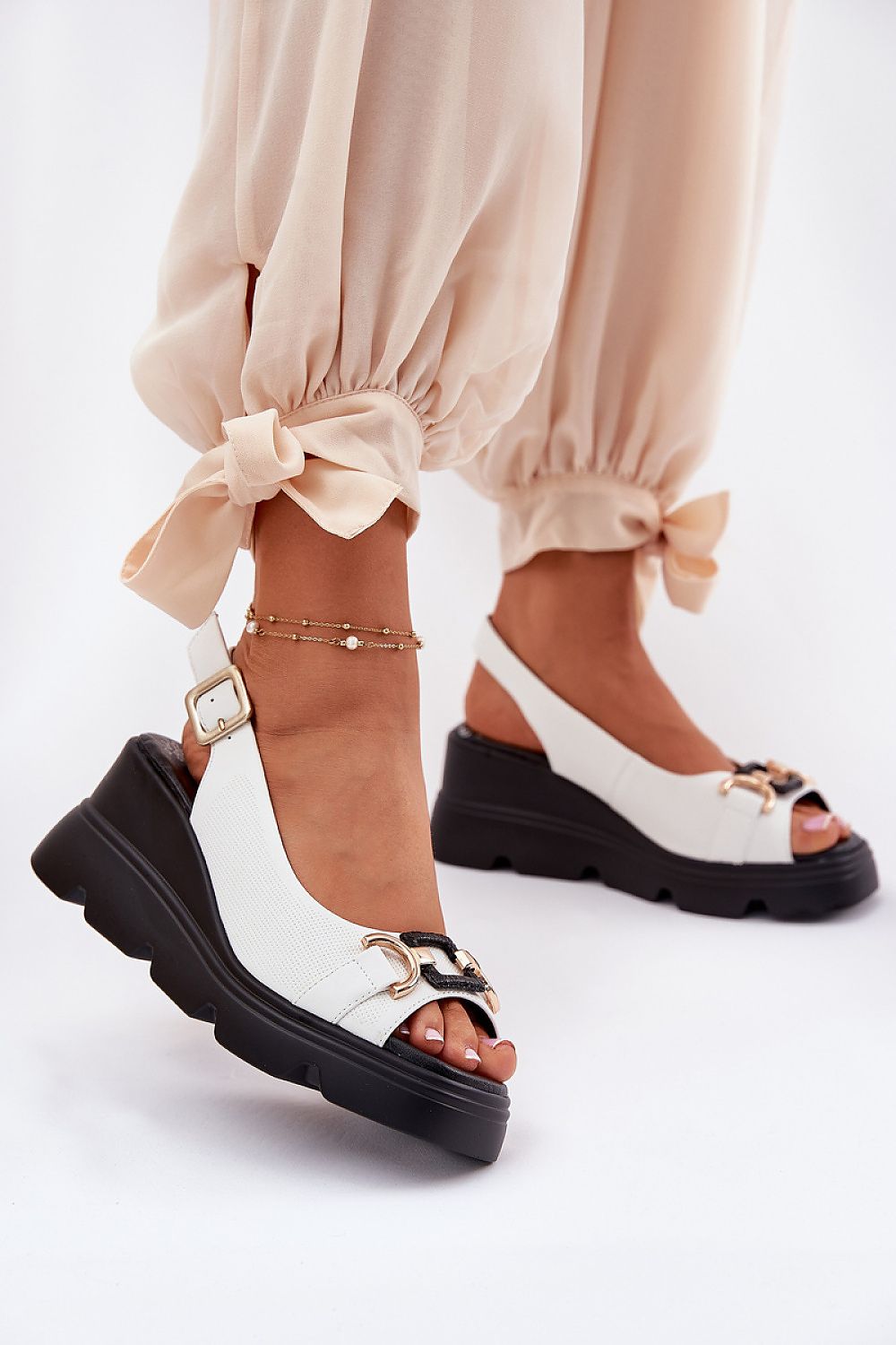 Elegant women's natural leather sandals by Step in Style featuring a 7.5cm wedge heel and adjustable buckle for a perfect fit, designed for timeless summer elegance and comfort.