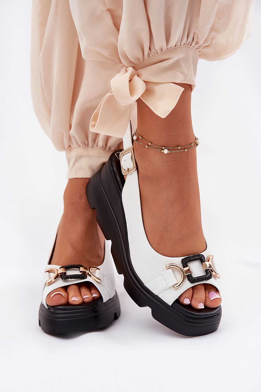 Close-up of Step in style's luxurious women's sandals made from premium natural leather, showcasing their elegant design and comfortable fit.