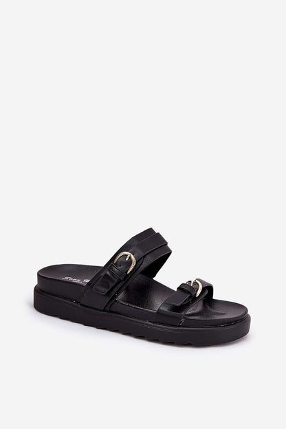 Close-up of Step in style women's platform flip-flops with artificial leather straps and elegant buckle accents for a sophisticated touch.