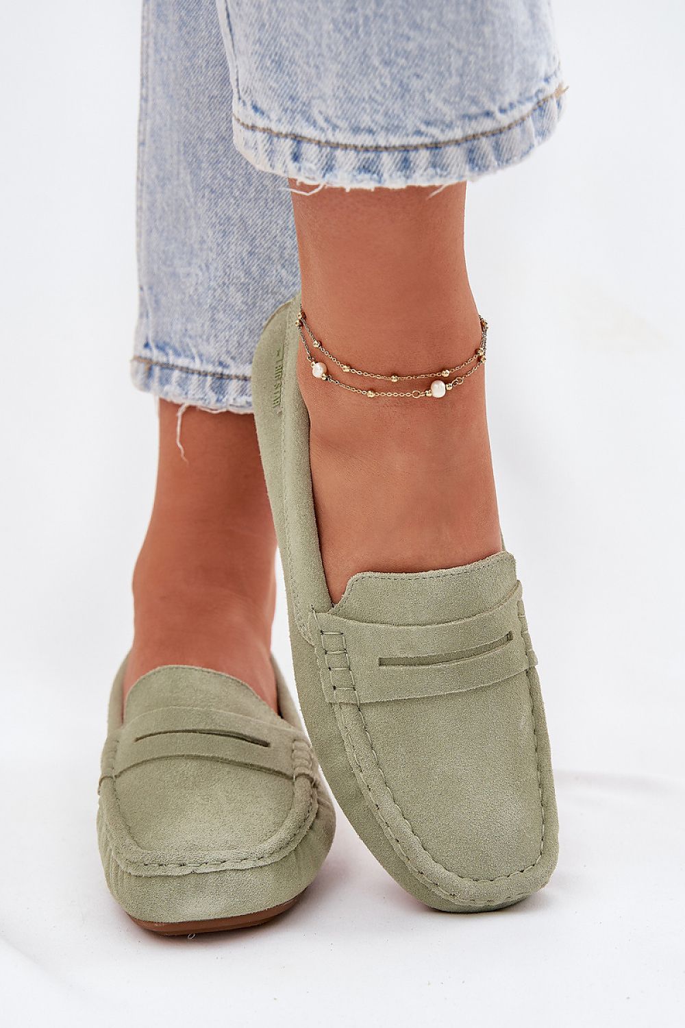 Soft leather insole of Step in Style women's suede loafers, providing superior cushioning and support for everyday wear.