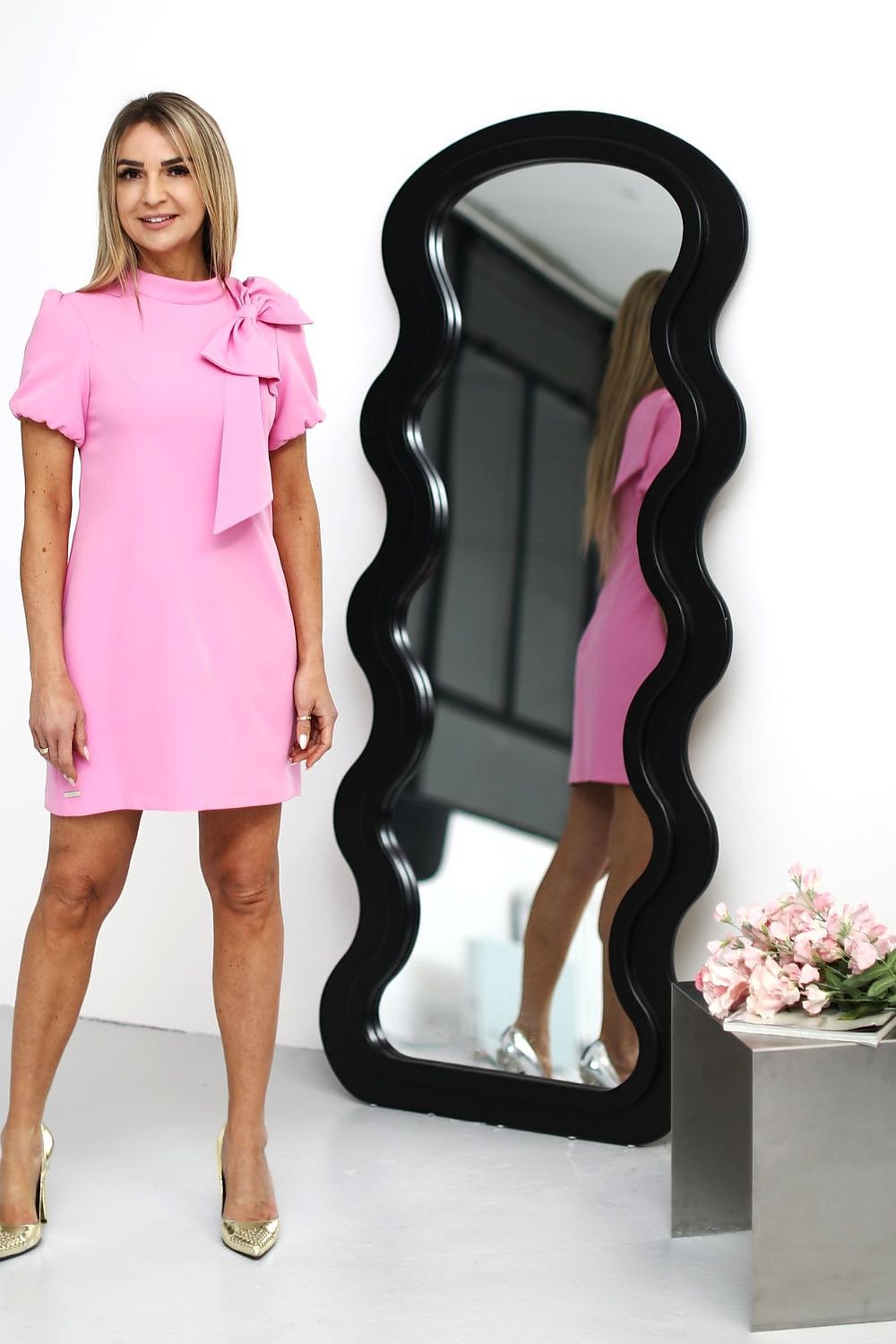 Luxury Barbie pink cocktail dress by Jersa featuring elegant bow detail, perfect for special occasions.
