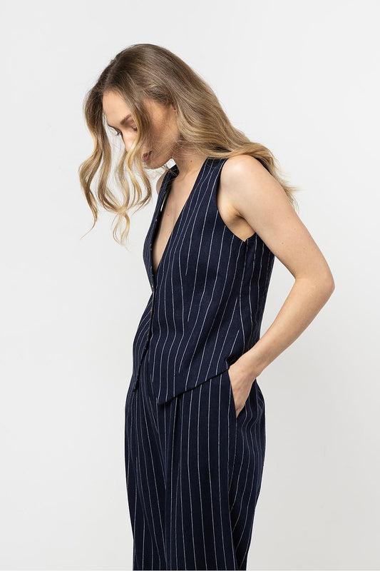 Elegant linen vest with a luxurious striped pattern by awama, showcasing breathable fabric and comfortable cotton lining, tailored for women's fashionable wear.
