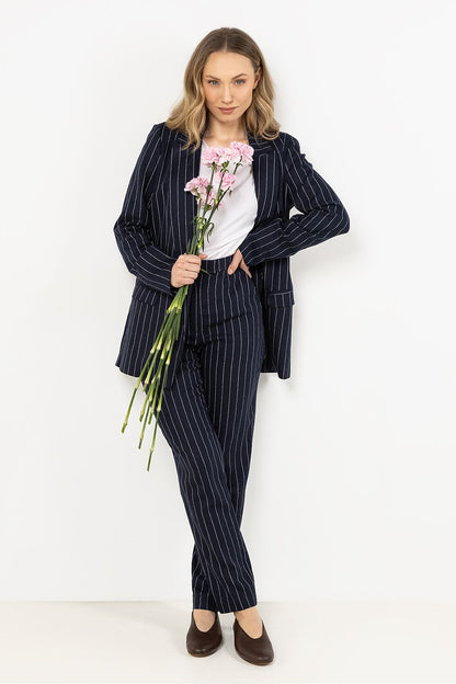 Elegant striped linen cigarette trousers for women by Awama, featuring a tapered cut for a flattering silhouette, perfect for both casual and formal occasions.