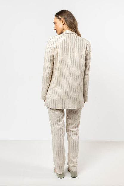 Stylish display of Awama's linen cigarette trousers in elegant stripes, highlighting the sophisticated cut and breathable fabric.