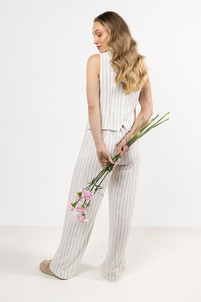 Chic and elegant linen trousers with elastic waistband by awama, offering a perfect fit and refined stripe pattern for luxurious dressing.