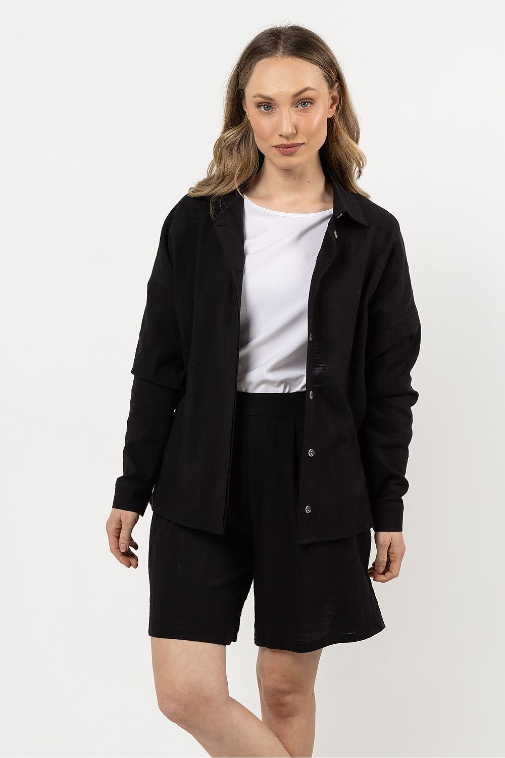 Close-up of the exquisite stitching and stand-up collar design of the Awama long sleeve cotton shirt, representing luxury craftsmanship.