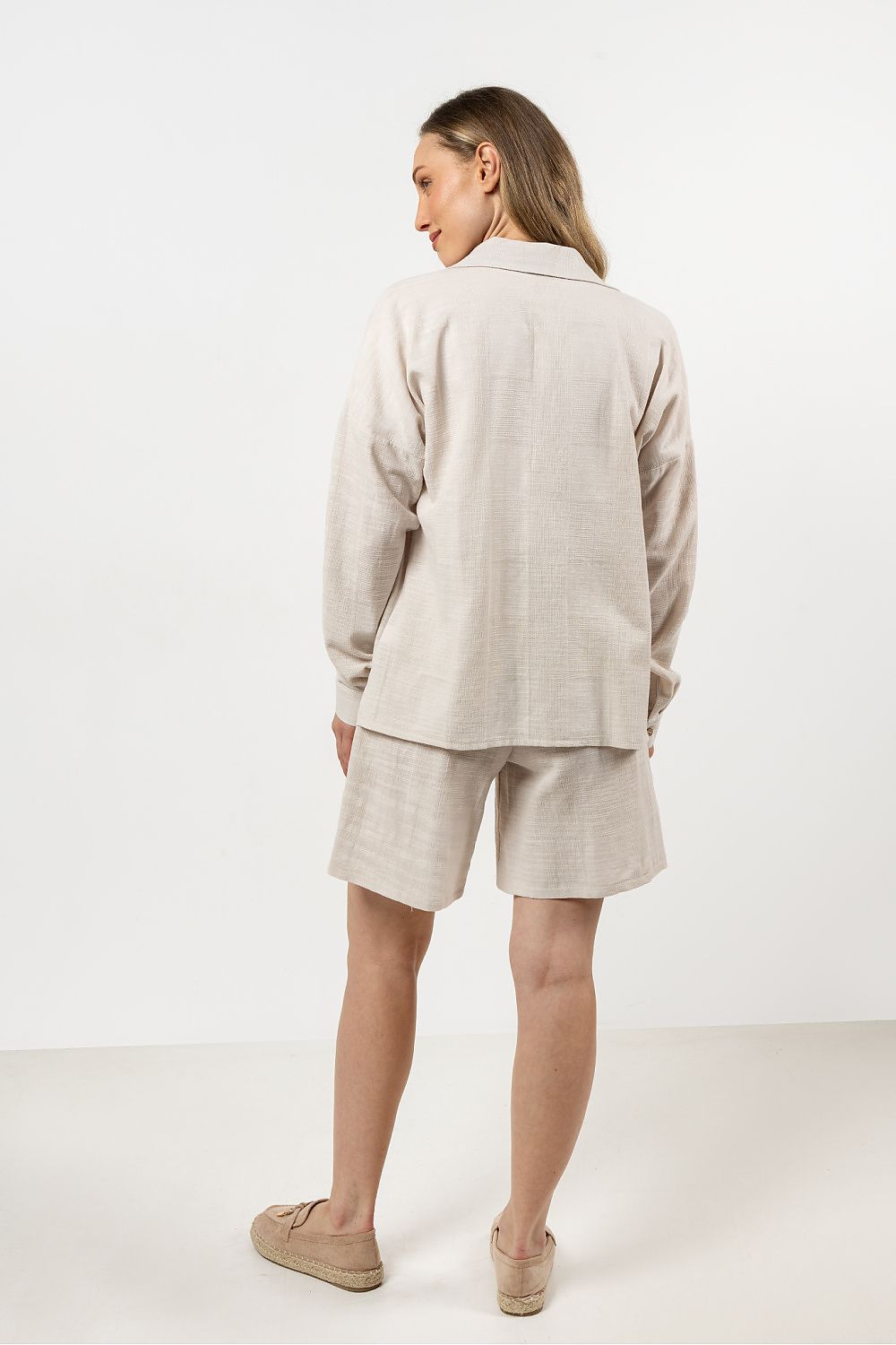 Close-up of the luxurious Awama long sleeve shirt collar detail, highlighting the sophisticated craftsmanship and elegant design for women's fashion.