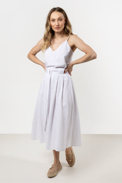 Elegant flared cotton skirt by Awama featuring a wide waistband, perfect for stylish summer occasions.