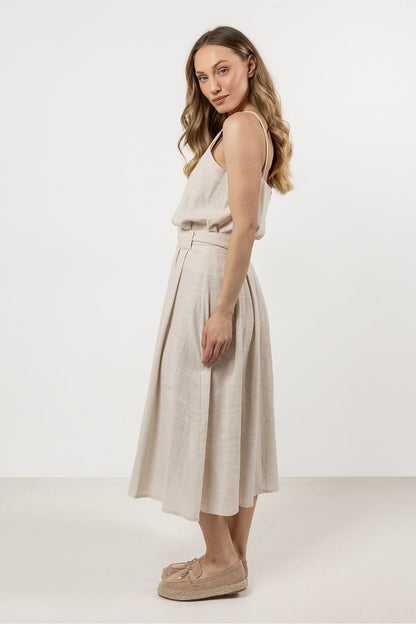 Elegant cotton flared skirt with wide waistband by Awama, showcasing a stylish pleated design in a luxurious fabric, perfect for both everyday and special occasions.