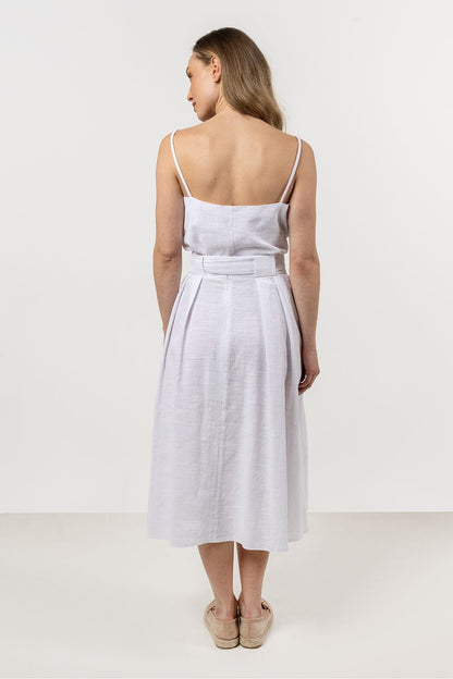 Chic hip-length cotton top by Awama, ideal for pairing with skirts or shorts, enhancing your summer wardrobe effortlessly.