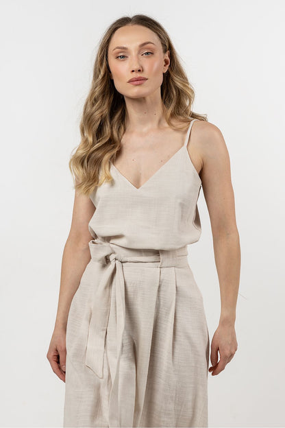 Stylish flat lay of Awama cotton top alongside accessories, ideal for creating effortless summer outfits.