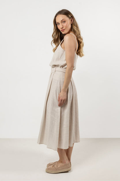 A range of sizes of the elegant cotton top by Awama displayed, perfect for curating a fashionable summer wardrobe.