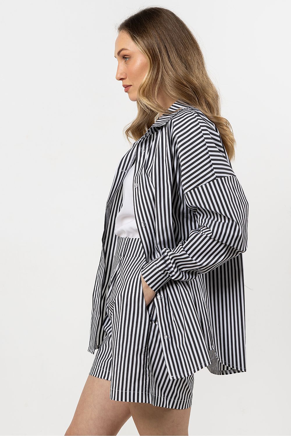 Close-up detail of the Awama luxury cotton shirt's buttons and cuffs, highlighting the elegant design and premium fabric.