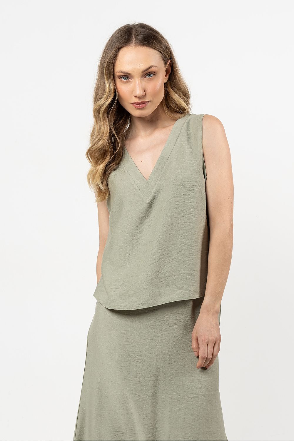 Elegant V-Neck Blouse by Awama showcasing a sophisticated design, ideal for both casual and formal wear.