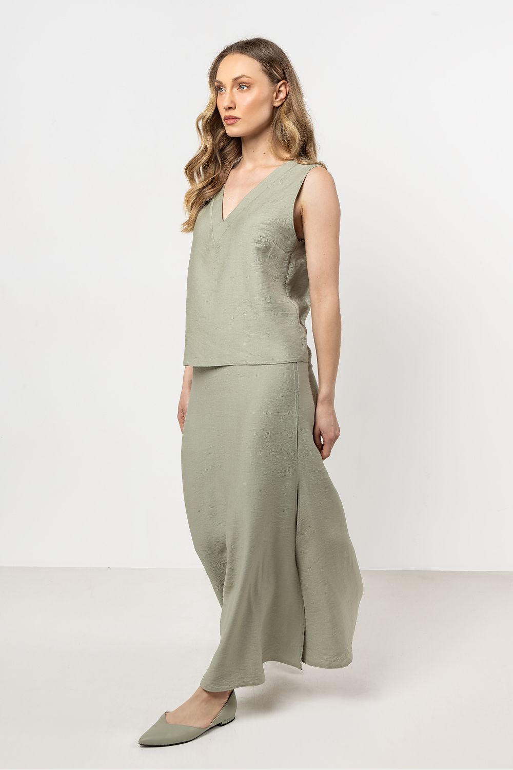 Close-up view of the fabric texture of the Awama Elegant V-Neck Blouse, highlighting its comfort and quality.