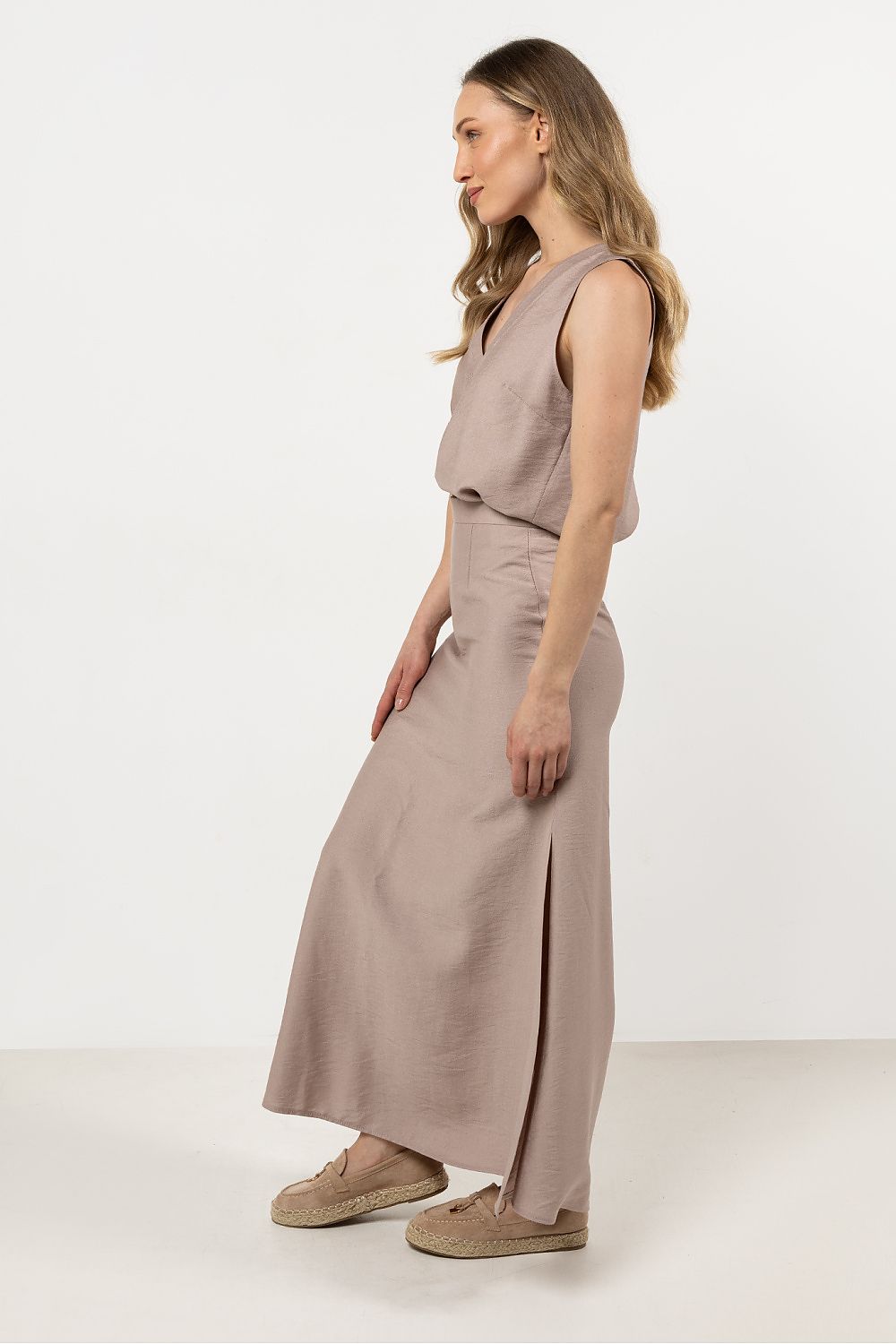 Elegant V-Neck Blouse by Awama in soft fabric, showcasing a flattering silhouette and comfortable fit, perfect for any occasion.