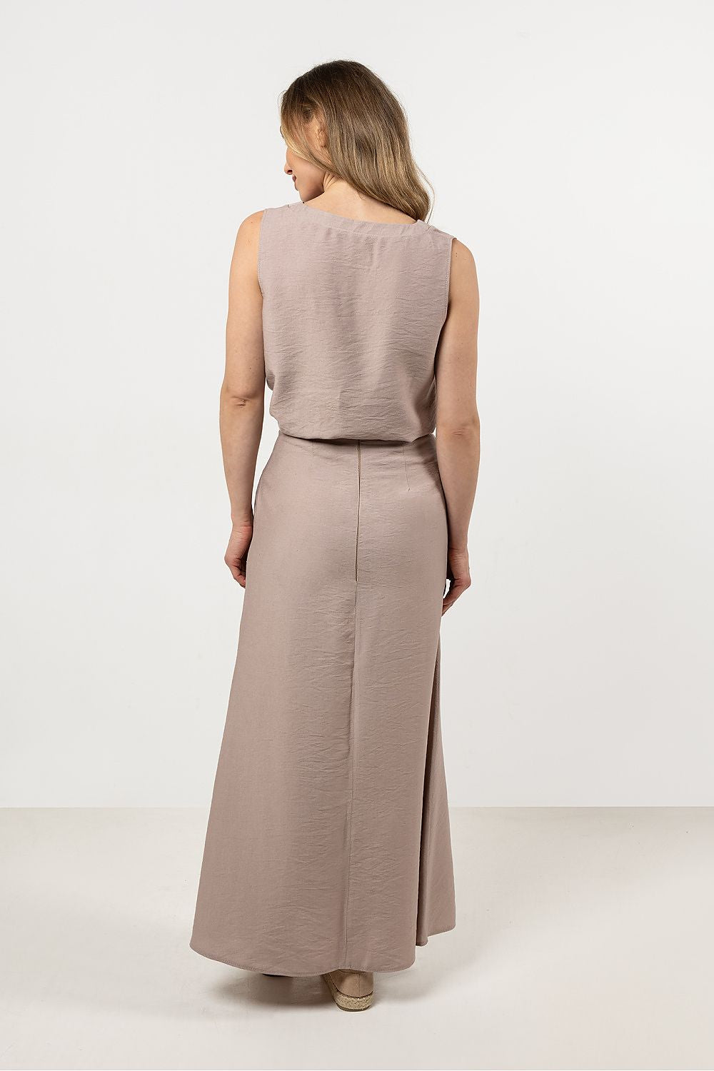 Luxurious rayon skirt with a flared silhouette and slit detail, available in sizes S to XL by awama, ideal for any classy outing.