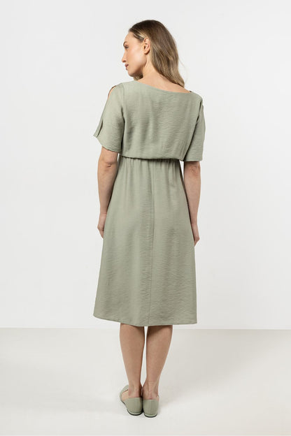 Diverse size options of the Awama daydress displayed in a luxurious setting, emphasizing its chic yet comfortable design for every occasion.