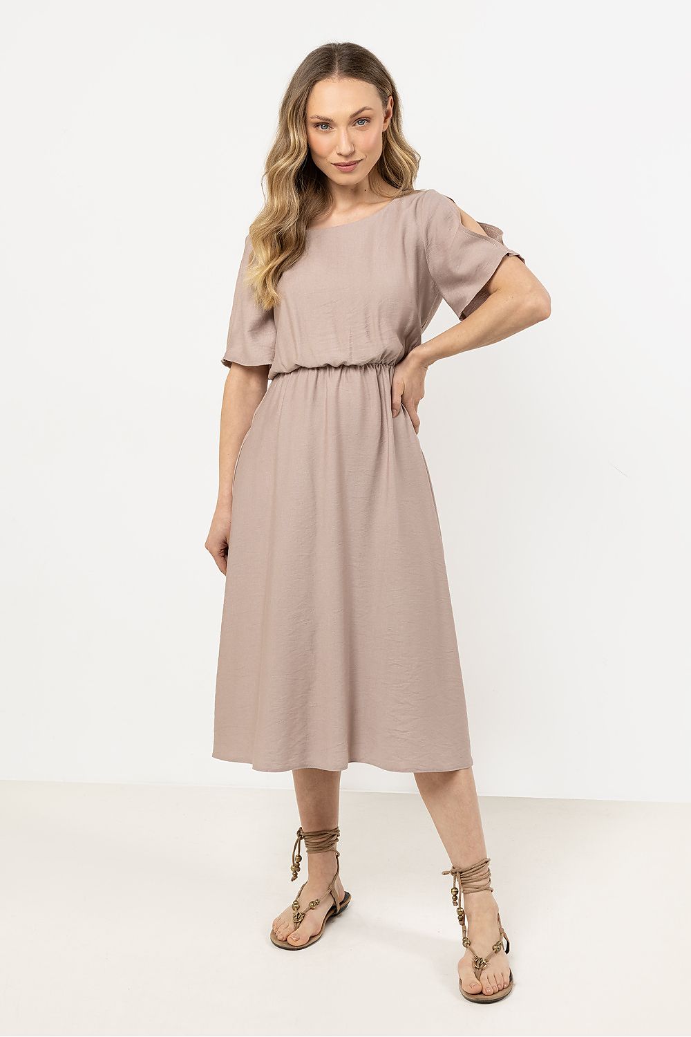 Model wearing the Awama daydress, exuding elegance and grace, perfect for both casual outings and special events.