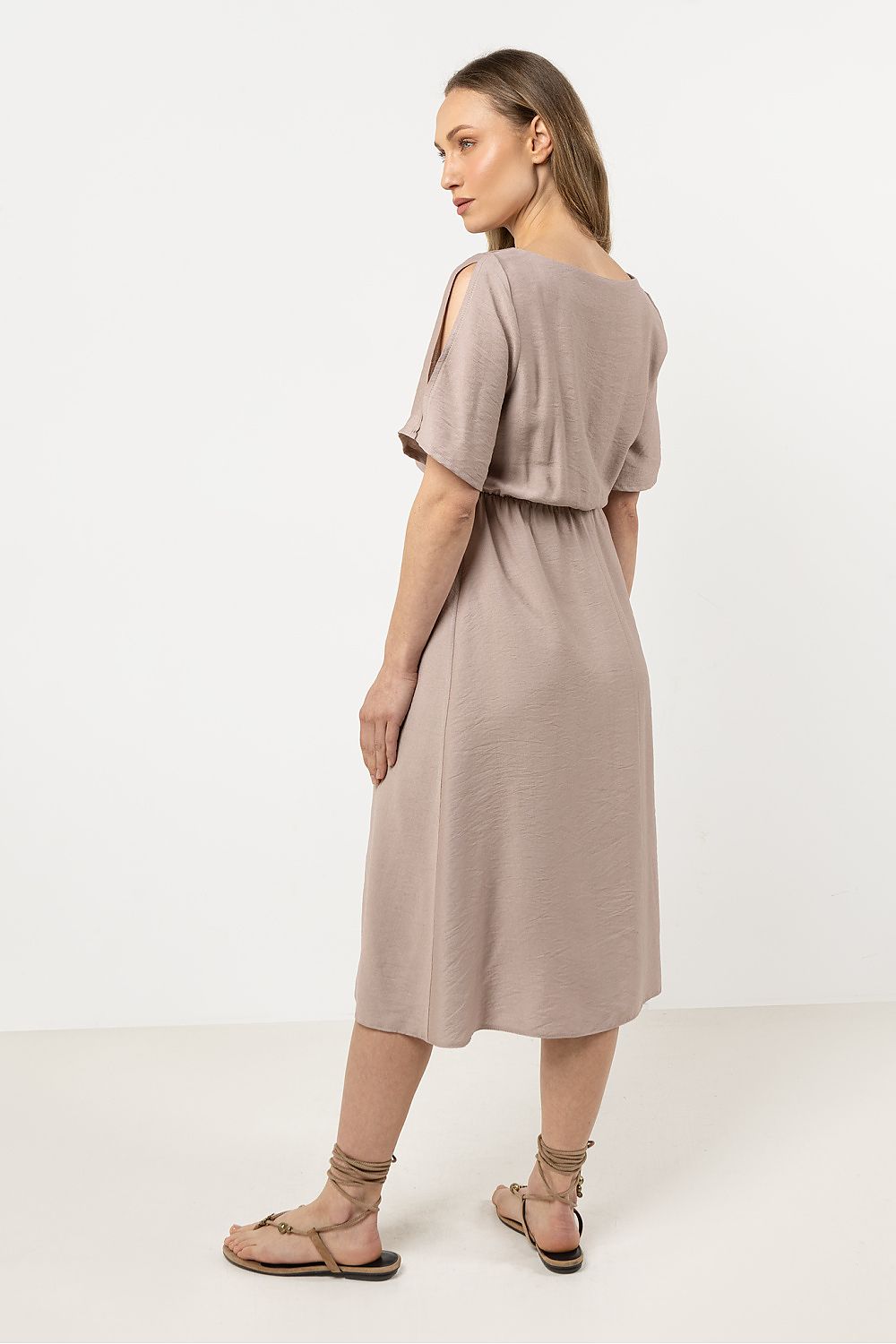 Stylish flat lay of the Awama daydress, capturing the premium fabric and fashionable design details that define luxury.