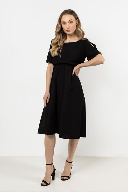 Elegant Awama daydress featuring a classic boat neckline and elastic waistband for a perfect fit, ideal for both everyday wear and special occasions.
