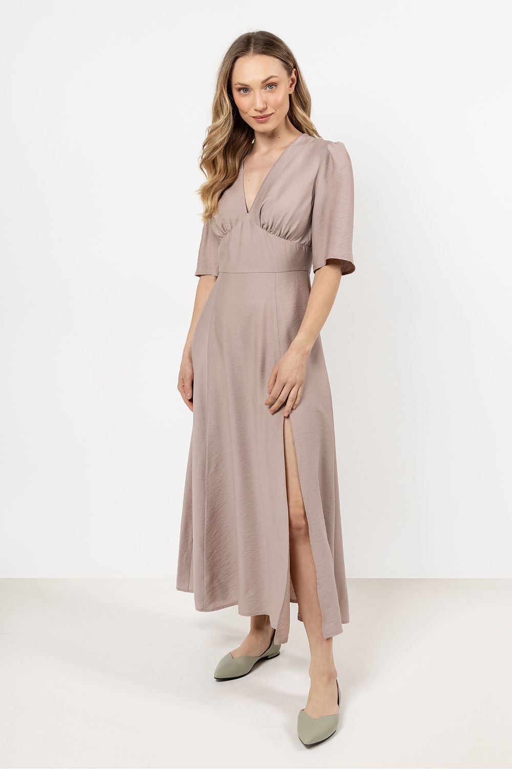 Awama Elegant Daydress in soft rayon featuring a V-neck and belted waist, showcasing feminine charm and classic style.