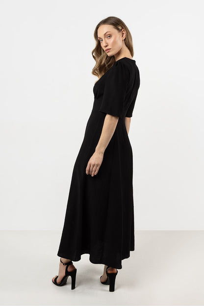 Awama elegant daydress in soft rayon, featuring a V-neckline and belted waist with a fashionable slit, perfect for feminine charm and sophisticated style.
