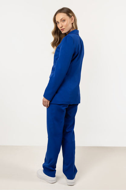 Complete look with Awama's fitted blazer styled elegantly with matching trousers, exemplifying a polished women's suit for special events and professional settings.