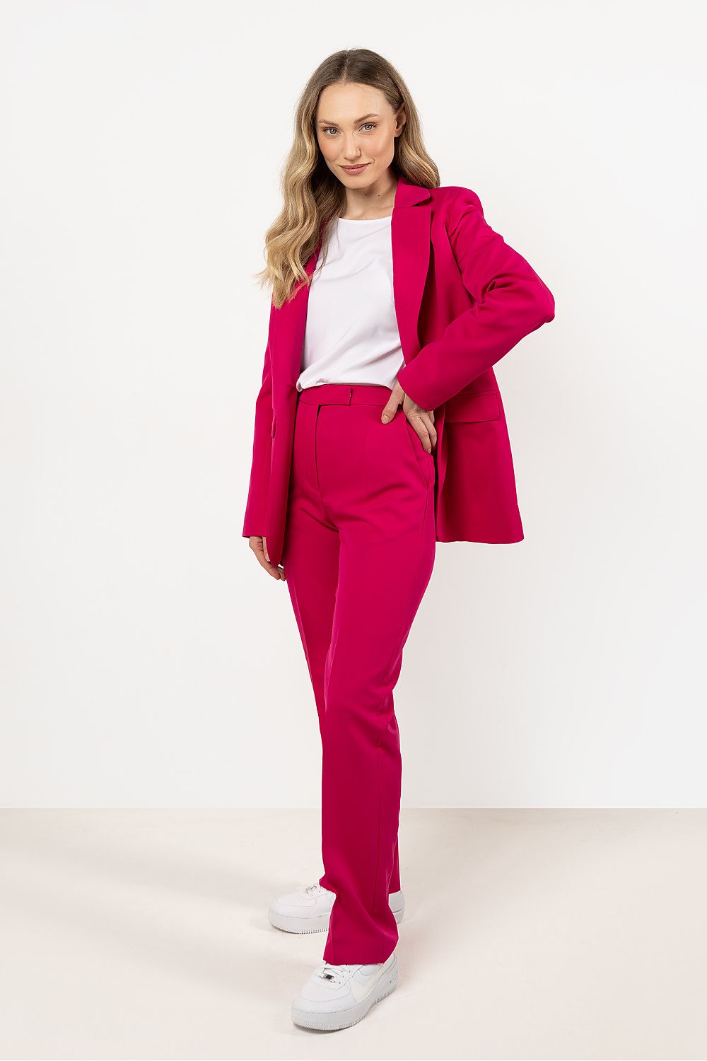 High-quality Awama women's trousers with decorative stripes, designed for elegance and comfort in formal settings.