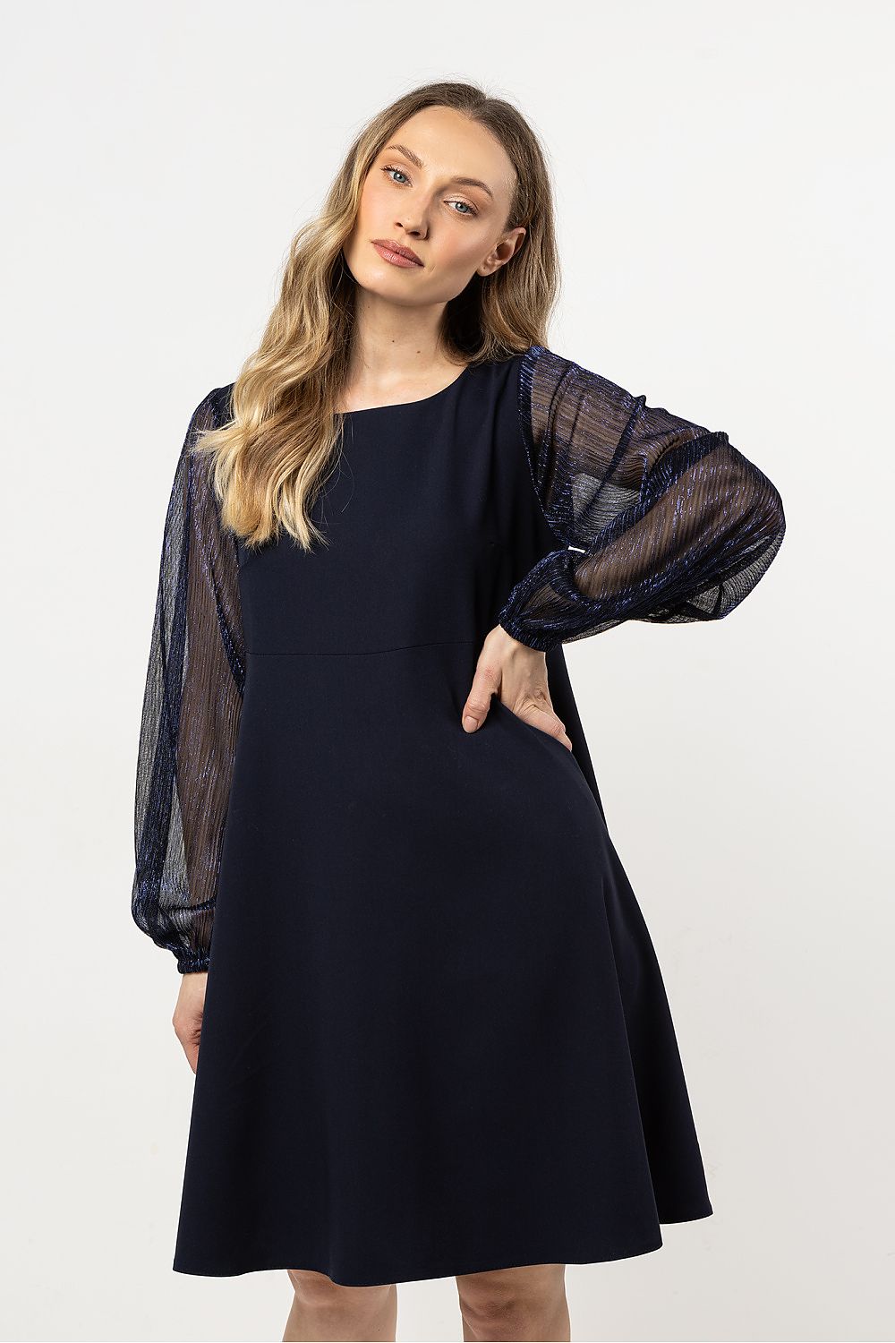 Luxury evening dress by Awama featuring elegant sheer tulle sleeves and a classic trapeze cut, perfect for special occasions.