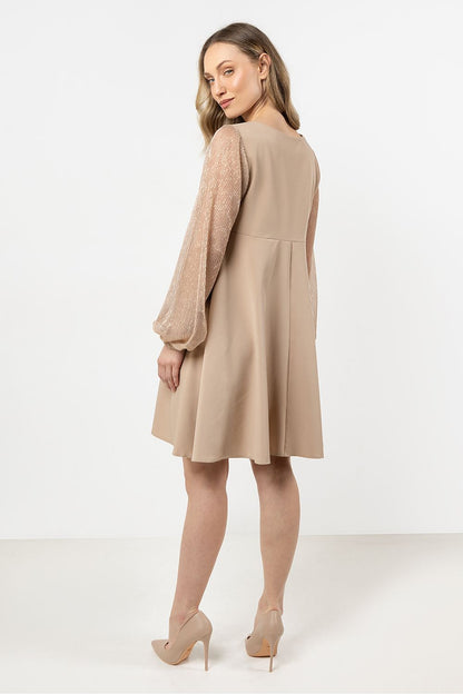 Close-up of Awama's luxury evening dress showcasing the glossy sheer tulle sleeves, emphasizing the sophisticated style and perfect fit for formal occasions.