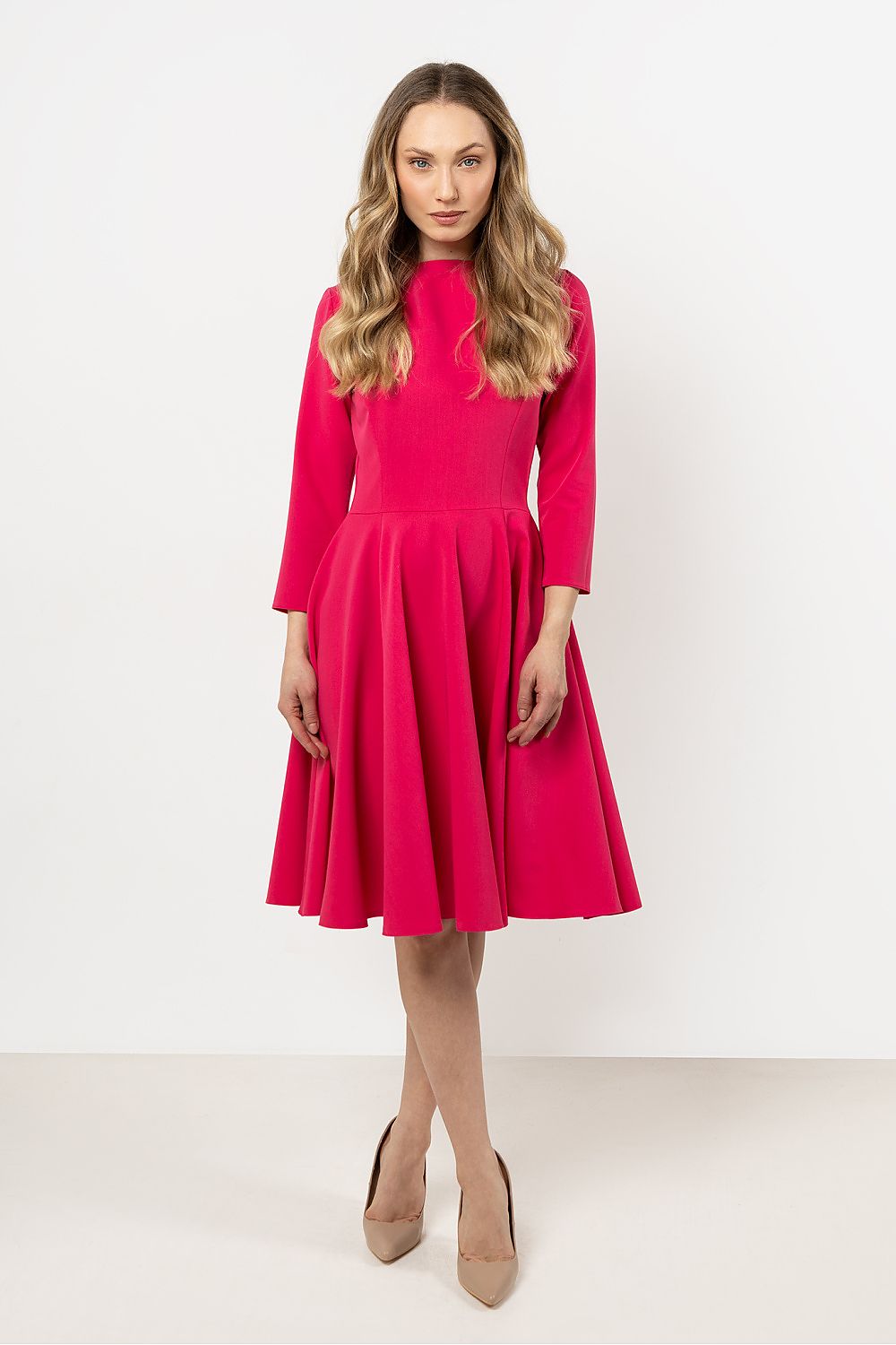 Elegant Awama flared daydress featuring a stylish boat neckline and 3/4 sleeves, perfect for special occasions.