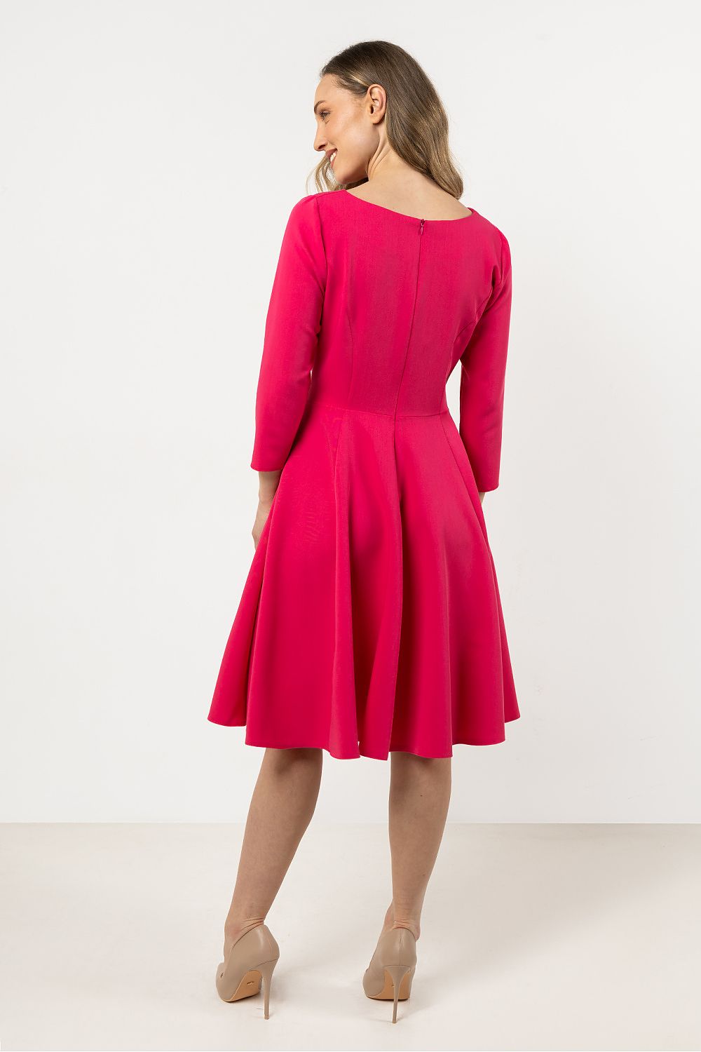 Close-up of the decorative pleats on the Awama daydress, adding charm to its elegant design.