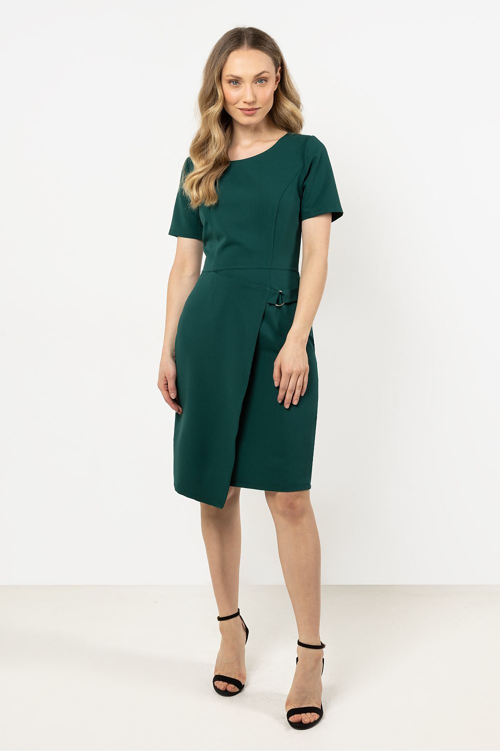 Side view of the Elegant Asymmetrical Hem Pencil Dress by Awama, capturing the flowing hemline and tailored fit that accentuates the female form.