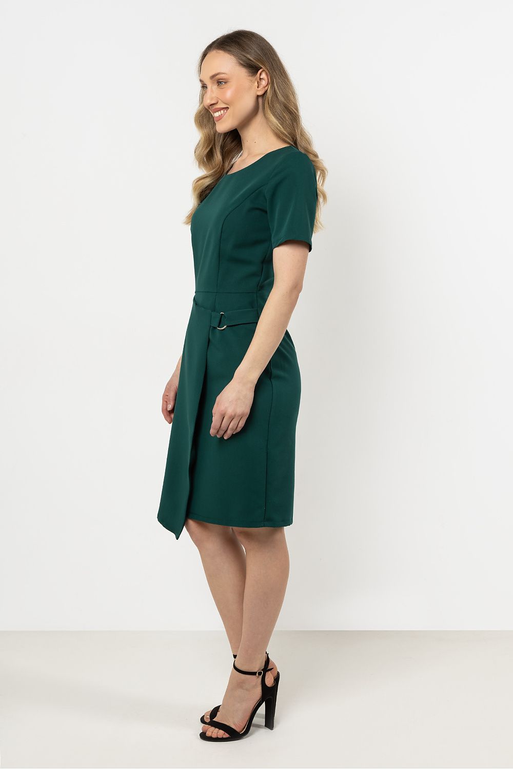 Close-up view of the luxurious fabric of the Awama asymmetrical hem pencil dress, highlighting its quality and sophisticated design.