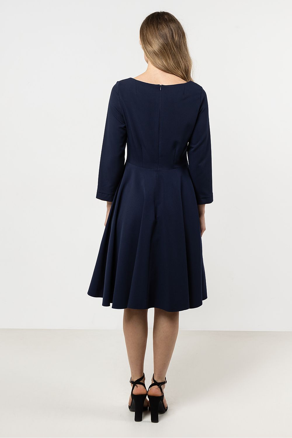 Back view of the Awama Elegant Flared Daydress featuring a concealed zipper for a seamless fit, perfect for any sophisticated occasion.