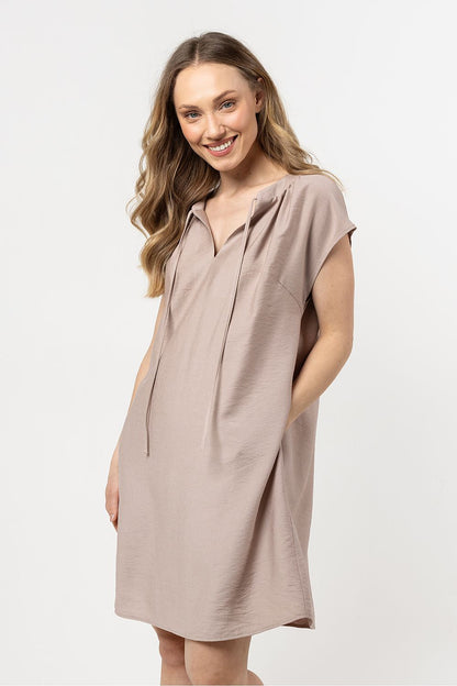 Elegant loose-fit daydress by Awama, showcasing breathable rayon fabric, adjustable neckline, and functional side pockets, perfect for warm weather styling.