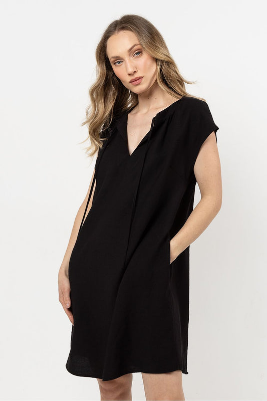 Elegant lightweight rayon daydress by Awama showcasing an adjustable neckline and stylish pockets, perfect for warm weather fashion.