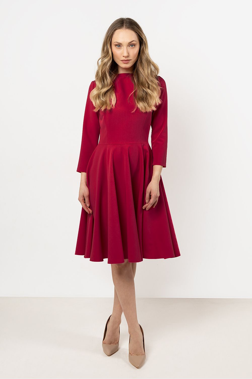 Close-up detail of Awama flared daydress showcasing decorative pleats on the boat neckline, ideal for chic gatherings.