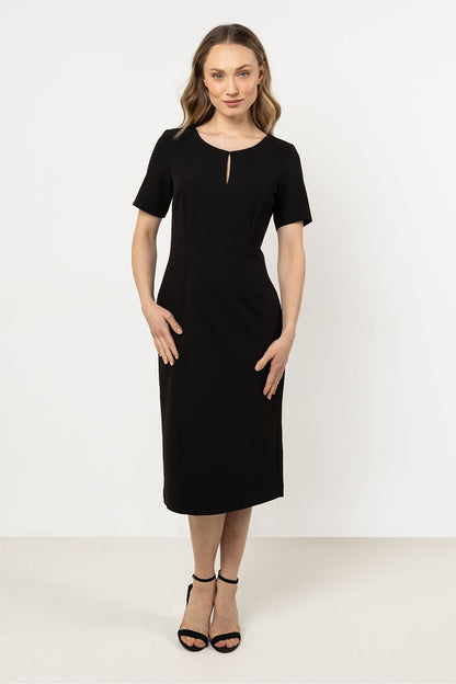 Detailed view of Awama's flattering daydress with a subtle slit at the neckline, exemplifying luxury and modern style.