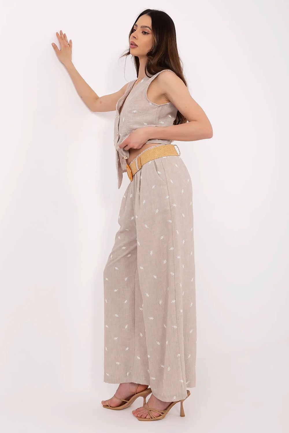 Close-up of the luxurious V-Neck Vest with decorative embroidery from Italy Moda's elegant women's 2-piece set.